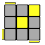 Top layer of Rubik's cube with 3 corner pieces needing to orient clockwise so that yellow is on the top.